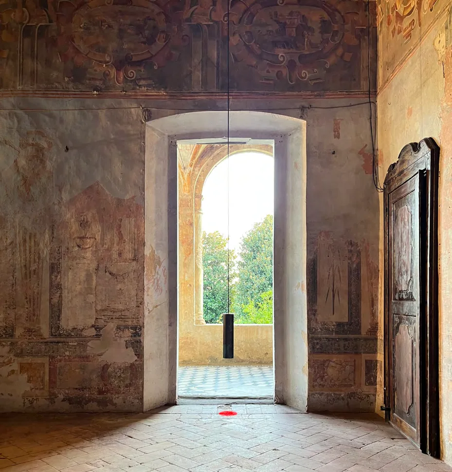 A light and sound device installed in a darkened historic room