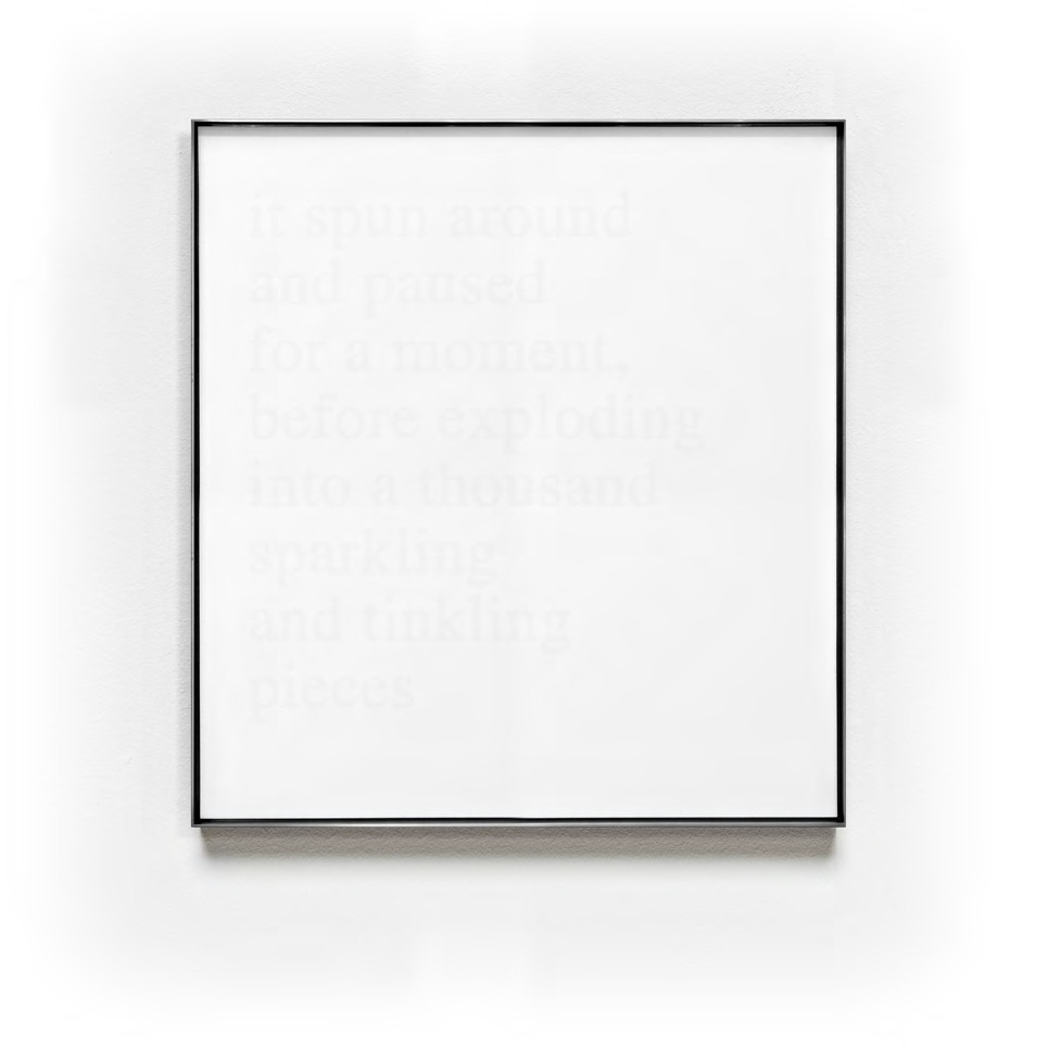 A pale framed text work from the 2% cycle